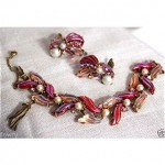 vintage schiaparelli carved glass bracelet and earrings set