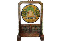 vintage tibetan stand with buddha